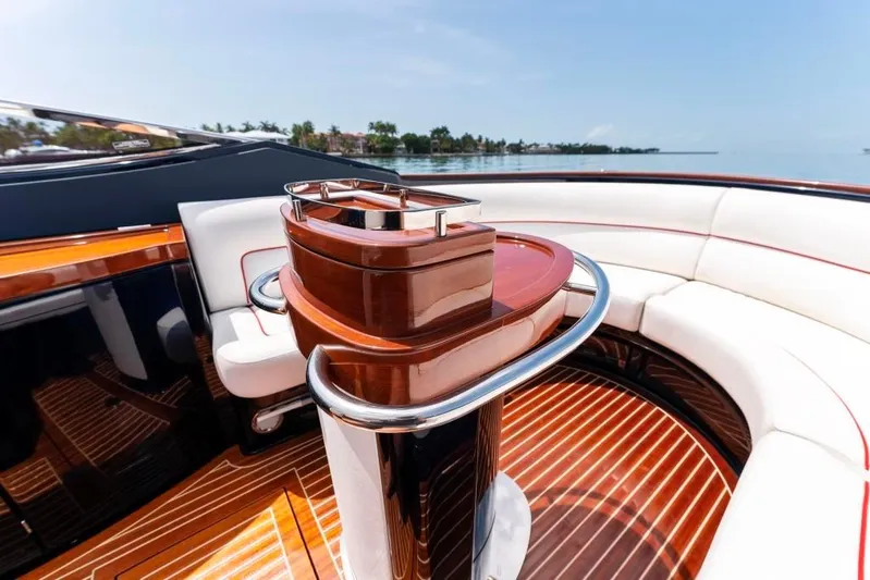 Our Trade Yacht Photos Pics Interior of 2020 Riva Aquariva Super luxury yacht with polished wood and white seating.