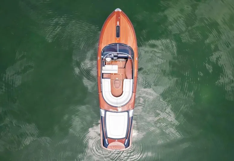 Our Trade Yacht Photos Pics Aerial view of a 2020 Riva Aquariva Super luxury boat on water.
