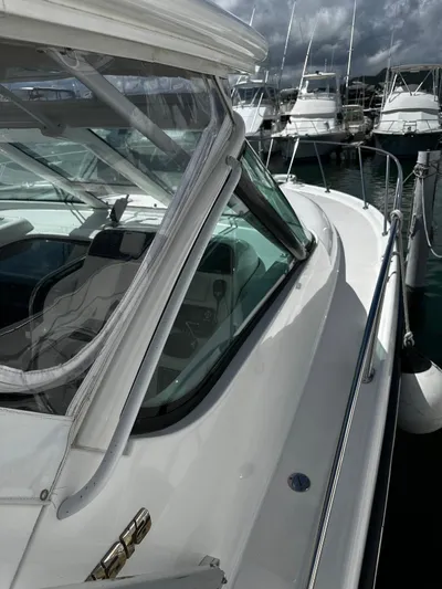  Yacht Photos Pics 2005 Tiara Yachts 3200 Open docked, showcasing sleek design and sturdy build.