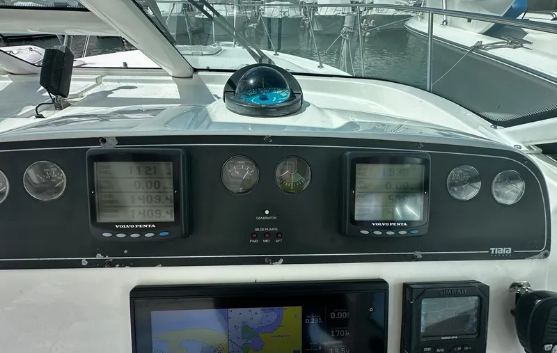  Yacht Photos Pics Dashboard of a 2005 Tiara Yachts 3200 Open with navigation instruments.