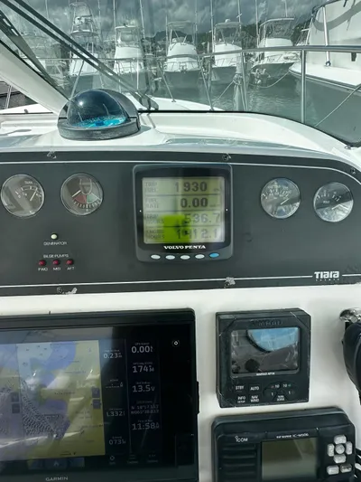  Yacht Photos Pics Dashboard of 2005 Tiara Yachts 3200 Open with navigation instruments.