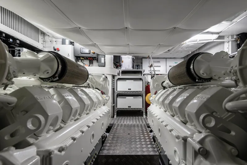 Our Trade Yacht Photos Pics Engine room of 2023 Pershing 6X yacht, showcasing advanced machinery and equipment.