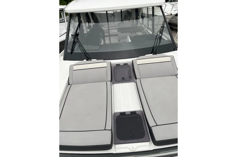  Yacht Photos Pics 2025 Jeanneau NC 895 Sport Series 2 boat with cushioned deck seating.