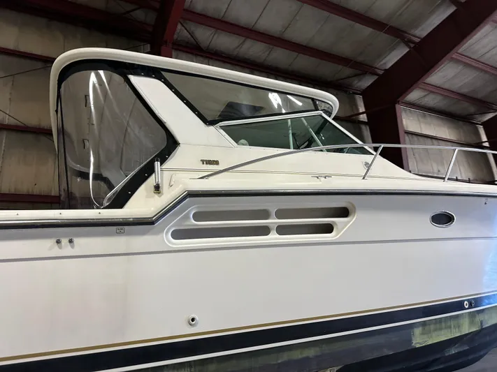 Superfishal II Yacht Photos Pics 1999 Tiara Yachts 4100 Open boat in indoor storage facility.