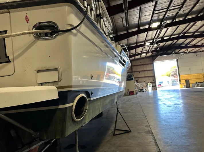 Superfishal II Yacht Photos Pics 1999 Tiara Yachts 4100 Open in a boatyard, showing rear view and exhaust.