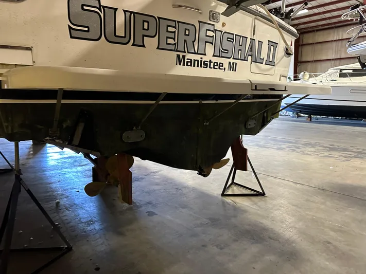 Superfishal II Yacht Photos Pics 1999 Tiara Yachts 4100 Open in storage, labeled "Super Fishal II," Manistee, MI.
