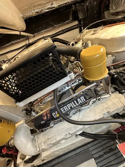 Superfishal II Yacht Photos Pics Engine compartment of a 1999 Tiara Yachts 4100 Open with Caterpillar engine components.