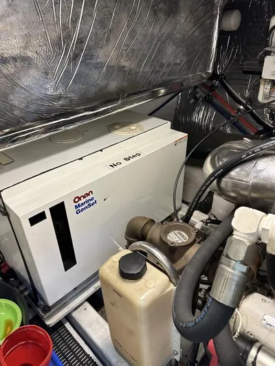 Superfishal II Yacht Photos Pics Engine room of 1999 Tiara Yachts 4100 Open with Onan Marine Genset.