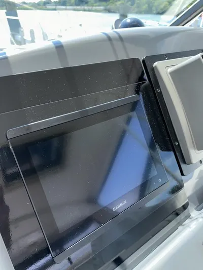 Superfishal II Yacht Photos Pics Garmin navigation display on 1999 Tiara Yachts 4100 Open dashboard.