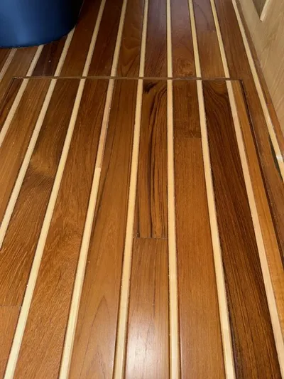 Superfishal II Yacht Photos Pics Teak wood flooring on a 1999 Tiara Yachts 4100 Open boat.