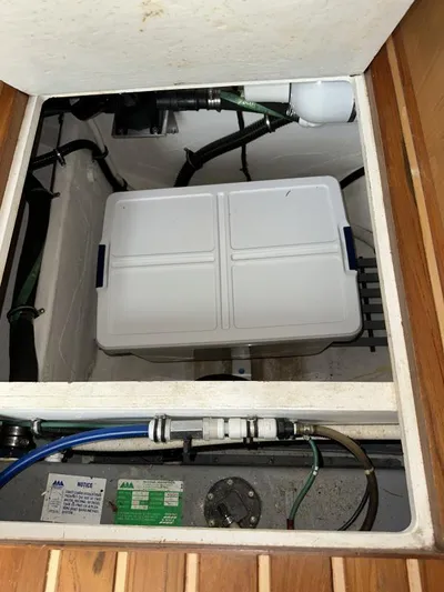 Superfishal II Yacht Photos Pics 1999 Tiara Yachts 4100 Open engine compartment with visible wiring and components.