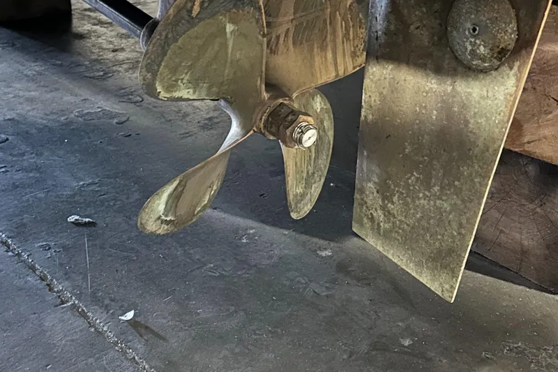 Superfishal II Yacht Photos Pics Propeller of a 1999 Tiara Yachts 4100 Open, showing wear and patina.