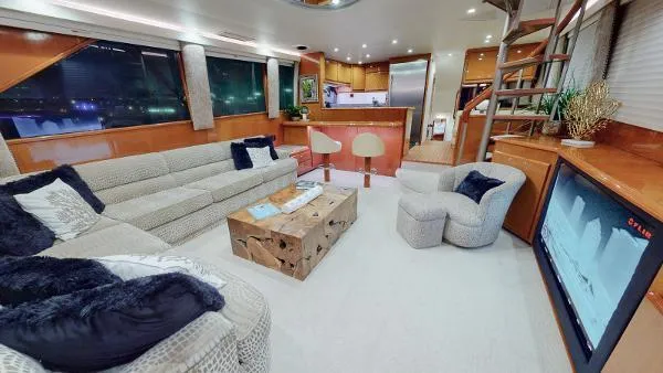 Reel Blonde Yacht Photos Pics Luxurious interior of a 1999 Viking 72 Sport Fish yacht with modern furnishings.