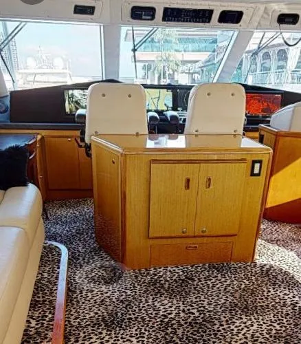 Reel Blonde Yacht Photos Pics Interior of 1999 Viking 72 Sport Fish yacht with leopard print carpet.
