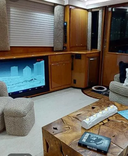 Reel Blonde Yacht Photos Pics Luxurious interior of a 1999 Viking 72 Sport Fish yacht with modern amenities.