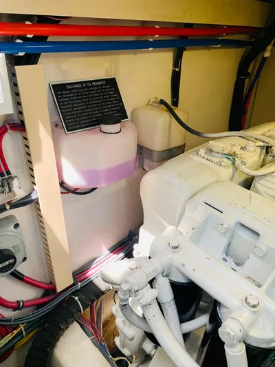 Sparrow Yacht Photos Pics Engine room of 2004 Sabre 42 Hardtop Express with visible components and wiring.