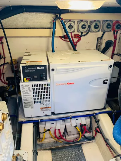 Sparrow Yacht Photos Pics Engine room of 2004 Sabre 42 Hardtop Express with Cummins Onan generator.