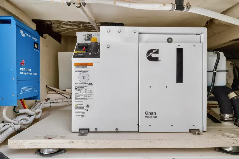 Knot Sorry Yacht Photos Pics Cummins Onan Marine QD generator in 2022 Tiara Yachts 38 LX engine room.