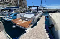 2019 Fjord 36' Open yacht docked in a marina under clear blue skies.