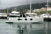 2019 Fjord 36' Open yacht docked in a marina with surrounding boats.