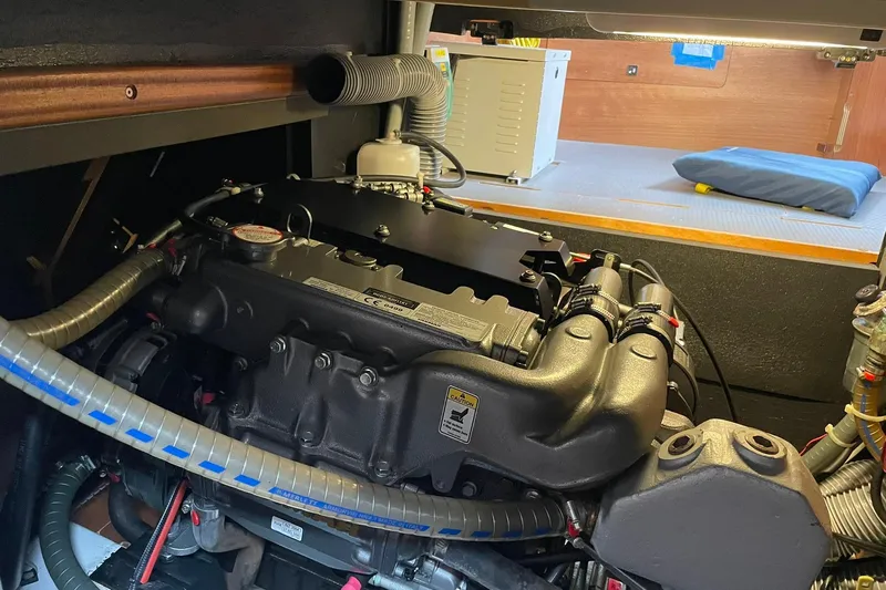 Genka Yacht Photos Pics Engine compartment of a 2017 Beneteau Sense 50 yacht, showcasing detailed mechanical components.