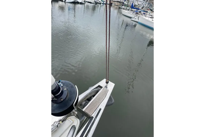 Genka Yacht Photos Pics Bow view of a 2017 Beneteau Sense 50 yacht in a marina.