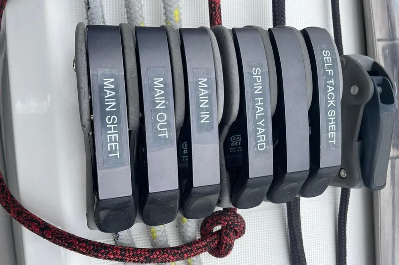 Genka Yacht Photos Pics Beneteau Sense 50 sailboat control lines labeled: Main Sheet, Main Out, Main In, Spin Halyard, Self Tack Sheet.