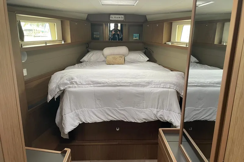 Genka Yacht Photos Pics Luxurious cabin interior of 2017 Beneteau Sense 50 yacht with cozy bedding.
