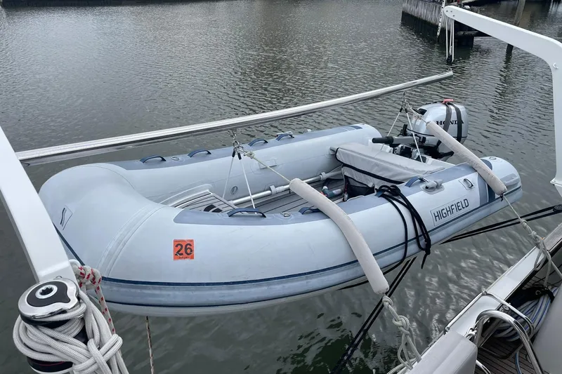 Genka Yacht Photos Pics Inflatable dinghy on Beneteau Sense 50 yacht, 2017 model, docked by the water.