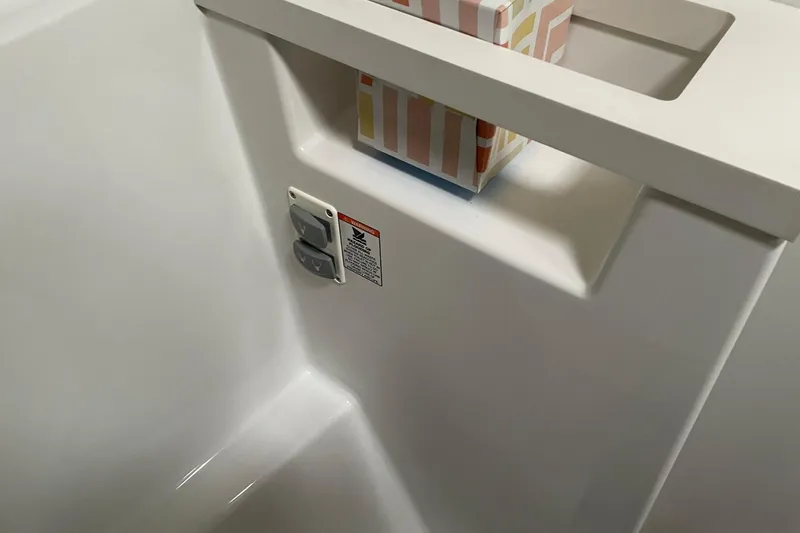 Genka Yacht Photos Pics Interior detail of 2017 Beneteau Sense 50 yacht, featuring a sleek white compartment.