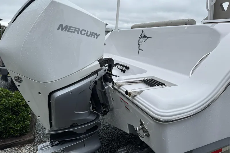  Yacht Photos Pics 2021 Sportsman Open 322 Center Console with Mercury outboard engine, rear view.