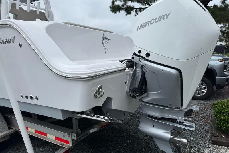  Yacht Photos Pics 2021 Sportsman Open 322 Center Console with Mercury outboard engine on trailer.