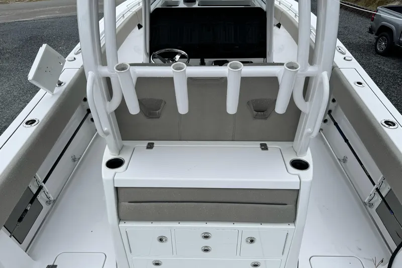  Yacht Photos Pics 2021 Sportsman Open 322 Center Console boat interior with rod holders and storage compartments.