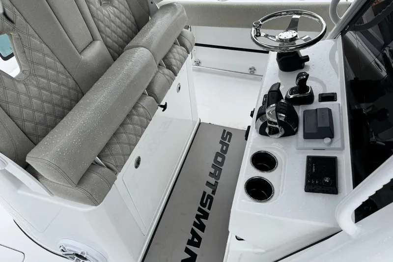 Yacht Photos Pics 2021 Sportsman Open 322 Center Console with wet seating and modern controls.