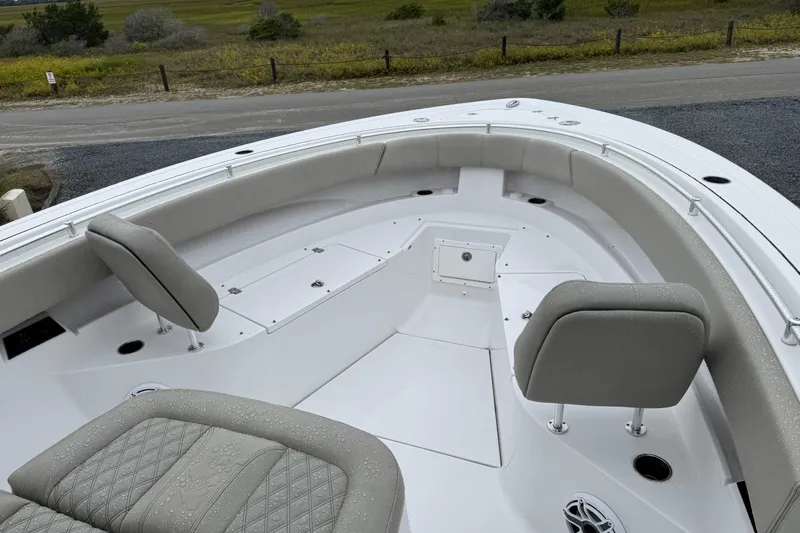  Yacht Photos Pics 2021 Sportsman Open 322 Center Console boat interior with cushioned seating and storage compartments.