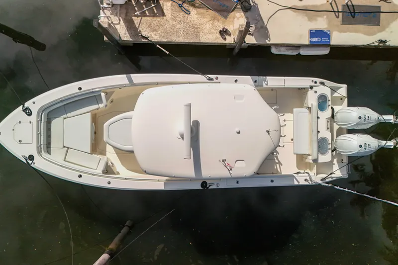  Yacht Photos Pics Overhead view of 2022 Cobia 350 Center Console boat docked with twin engines.