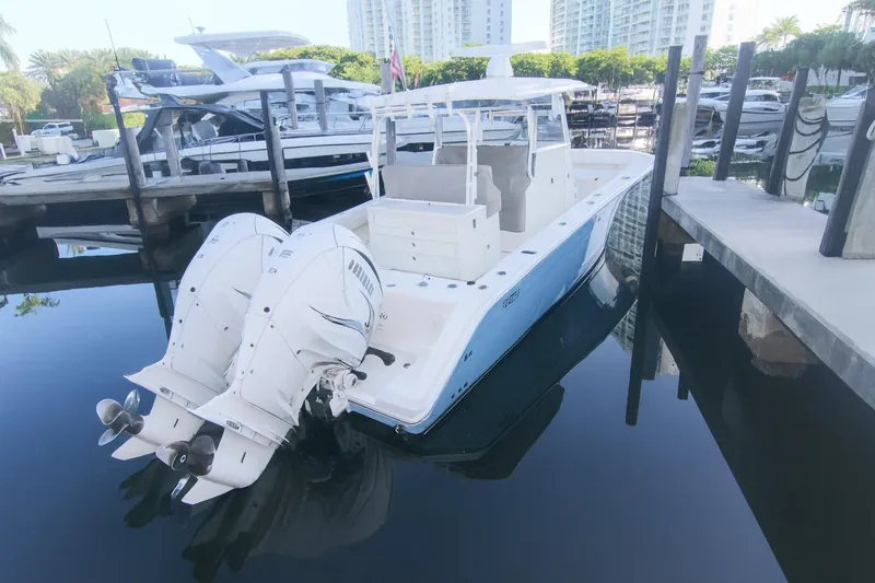  Yacht Photos Pics 2022 Cobia 350 Center Console boat docked with twin outboard engines.