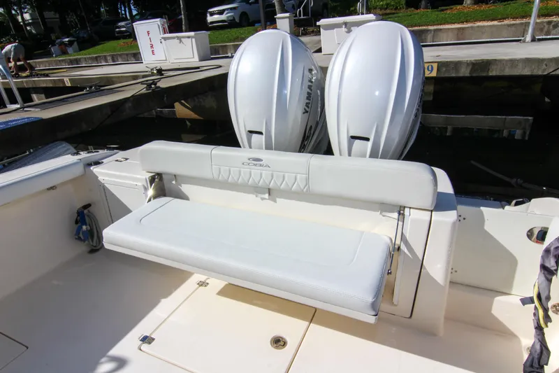 Yacht Photos Pics 2022 Cobia 350 Center Console boat with dual Yamaha engines at dock.