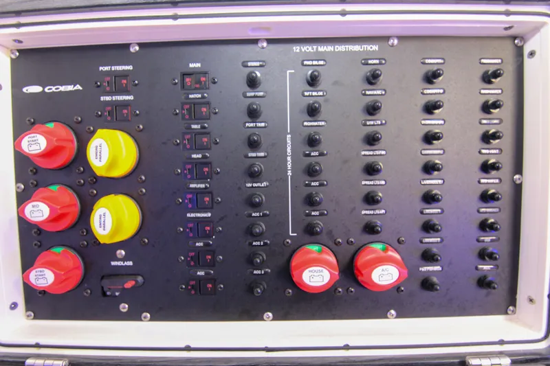  Yacht Photos Pics Electrical panel of 2022 Cobia 350 Center Console boat with switches and controls.