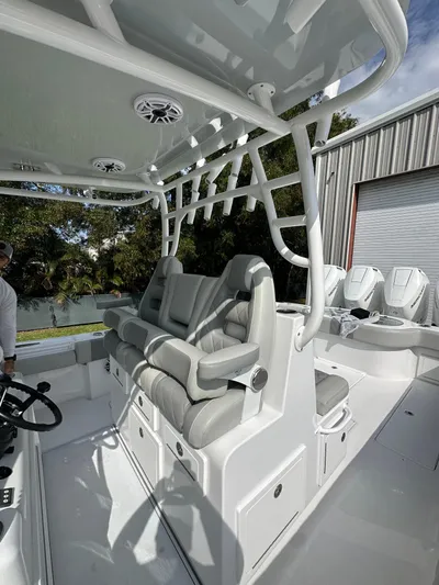  Yacht Photos Pics 2024 Onslow Bay 41 boat interior with cushioned seating and modern design.