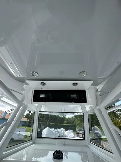  Yacht Photos Pics 2024 Onslow Bay 41 boat interior with control panel and windows.