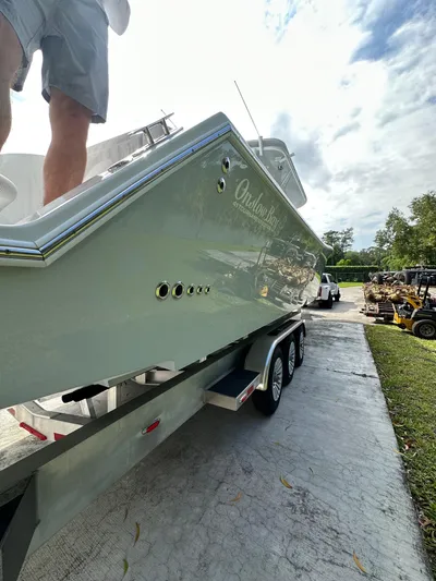  Yacht Photos Pics 2024 Onslow Bay 41 boat on trailer, viewed from rear, outdoors.