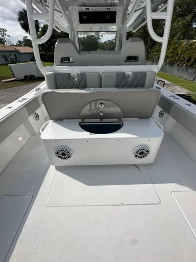  Yacht Photos Pics 2024 Onslow Bay 41 boat interior with seating and storage, featuring built-in speakers.