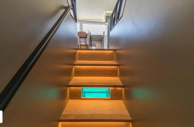 Bikini Sunset Yacht Photos Pics Illuminated staircase in Granocean 57 yacht, 2023 model.