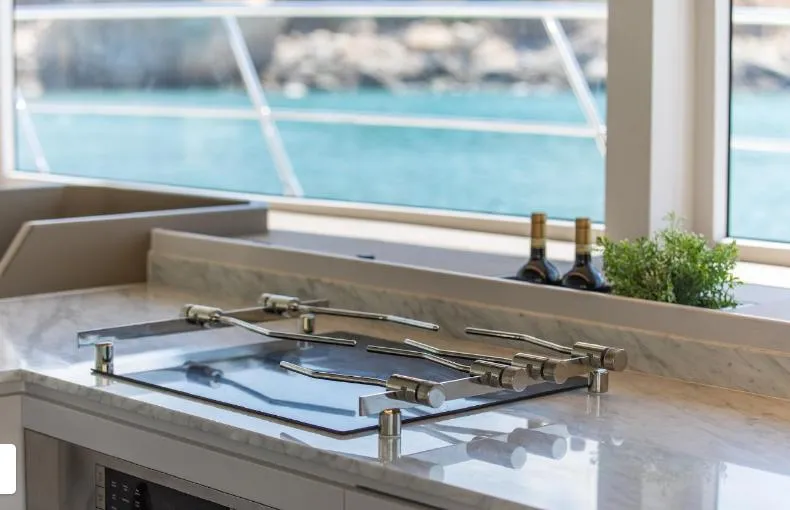 Bikini Sunset Yacht Photos Pics Luxurious Granocean 57 yacht kitchen with ocean view, 2023.