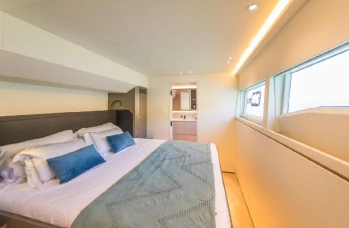 Bikini Sunset Yacht Photos Pics Luxurious bedroom on the Granocean 57 yacht, 2023 model.