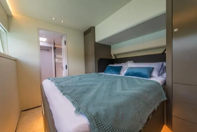 Bikini Sunset Yacht Photos Pics Luxurious bedroom on the Granocean 57 yacht, 2023 model.