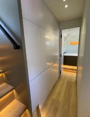 Bikini Sunset Yacht Photos Pics Modern hallway in a 2023 Granocean 57 yacht.