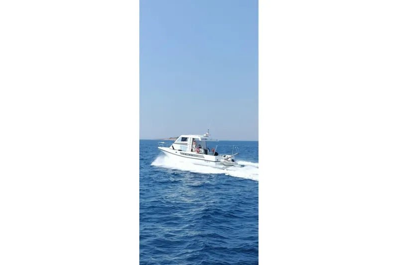 Captain Back Yacht Photos Pics 1988 Cantiere Navale di Pesaro Studio Mare Atmosfere 46 yacht cruising on open sea.