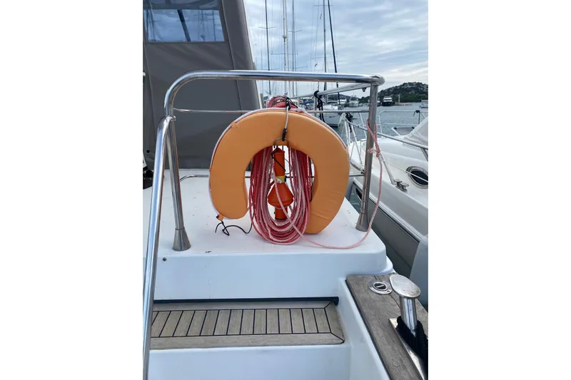 Captain Back Yacht Photos Pics Orange life preserver on 1988 Studio Mare Atmosfere 46 yacht deck, Cantiere Navale di Pesaro.